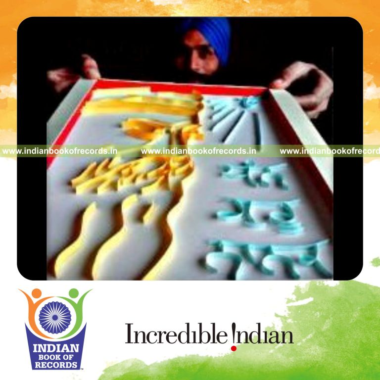 artist creating innovative paper portrait artwork for Indian Book of Records