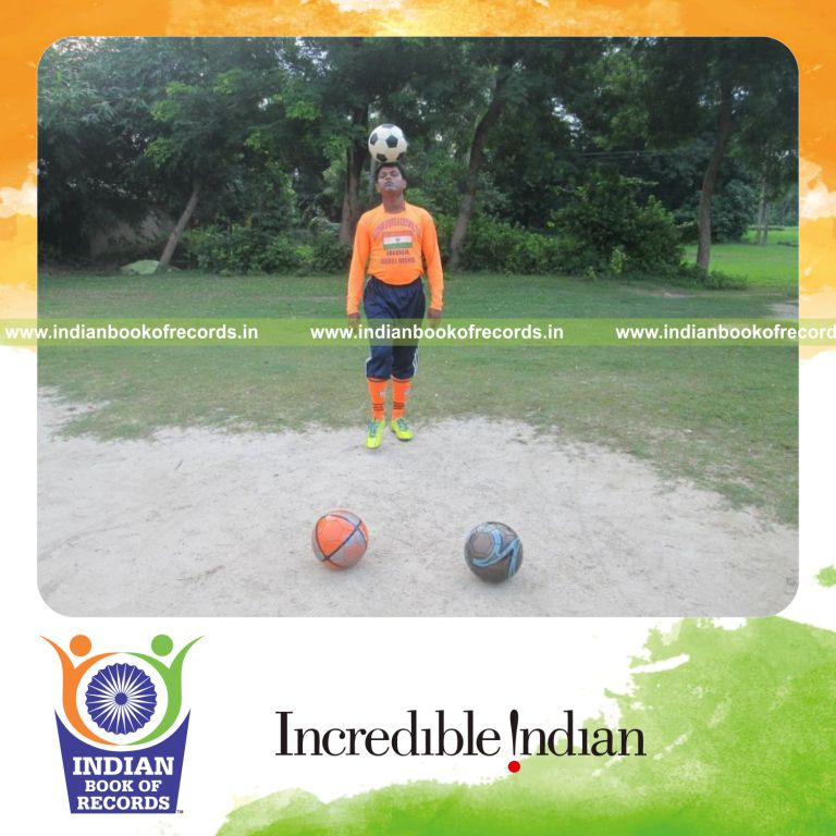 individual travelling distance with football balanced on head for Indian Book of Records