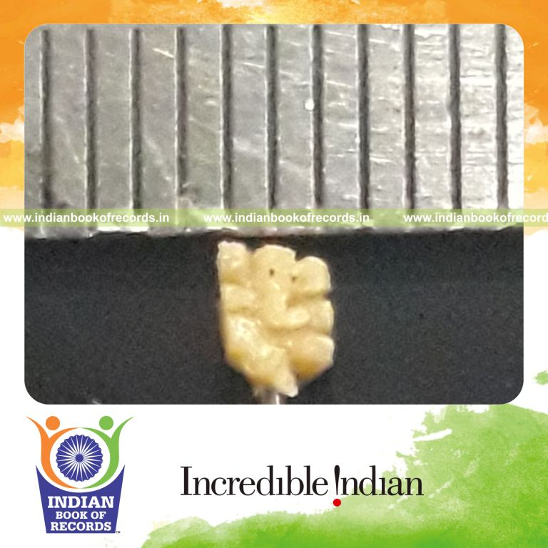Tiny Ganesha idol sculpted delicately on soap material recognized by Indian Book of Records