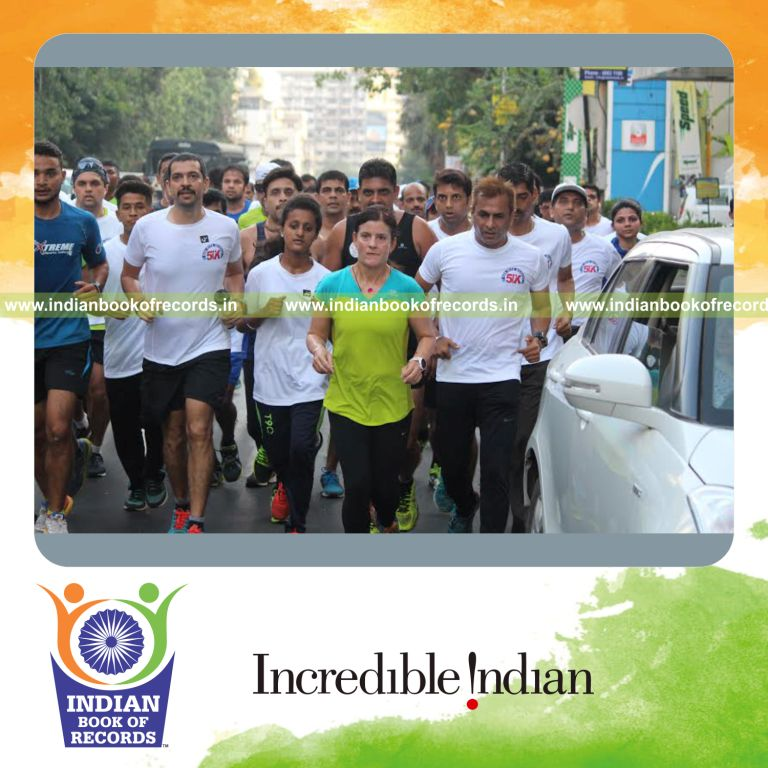 woman completing golden quadrilateral running challenge for Indian Book of Records