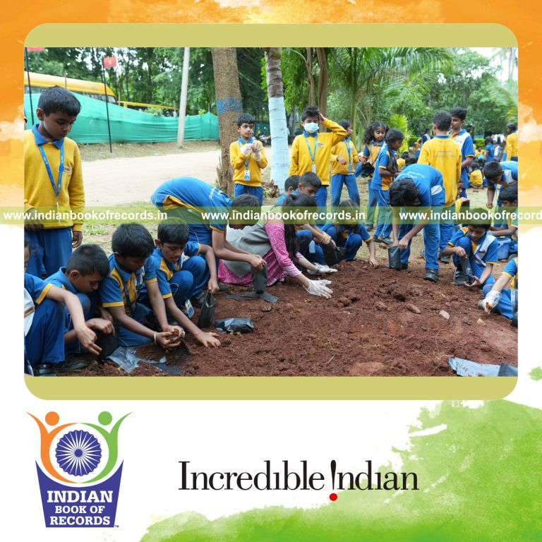 Team planting seeds in numerous grow bags within two hours at a single venue for the Indian Book of Records