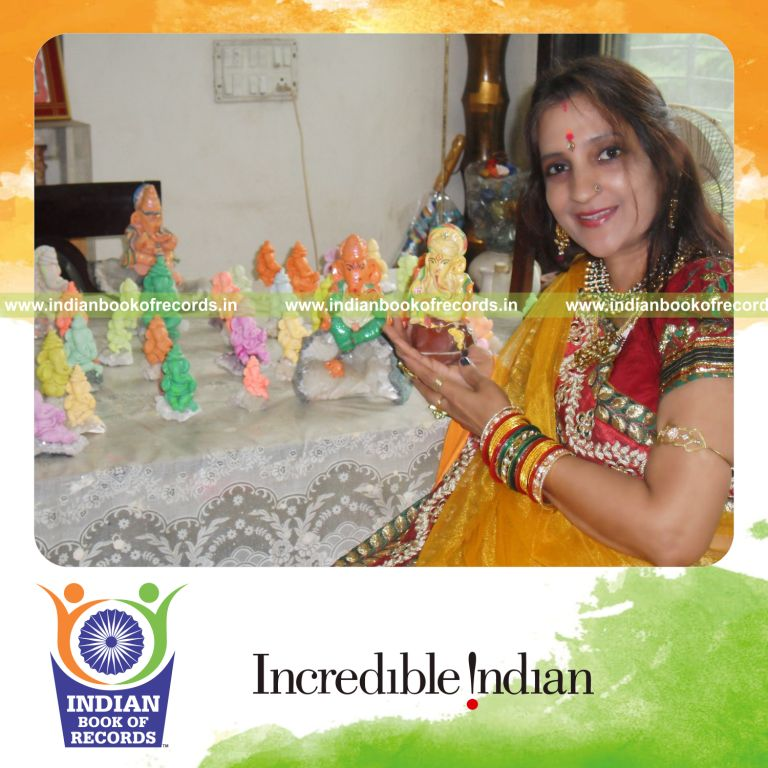 individual female creating handmade ganesha idols for Indian Book of Records