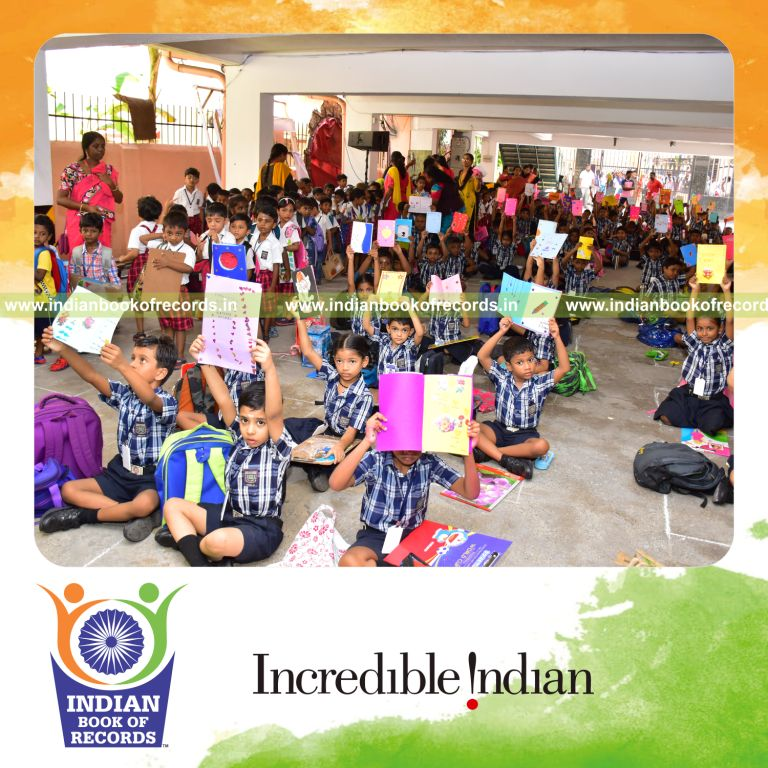 Participants crafting handmade greeting cards together at one location for an Indian Book of Records entry