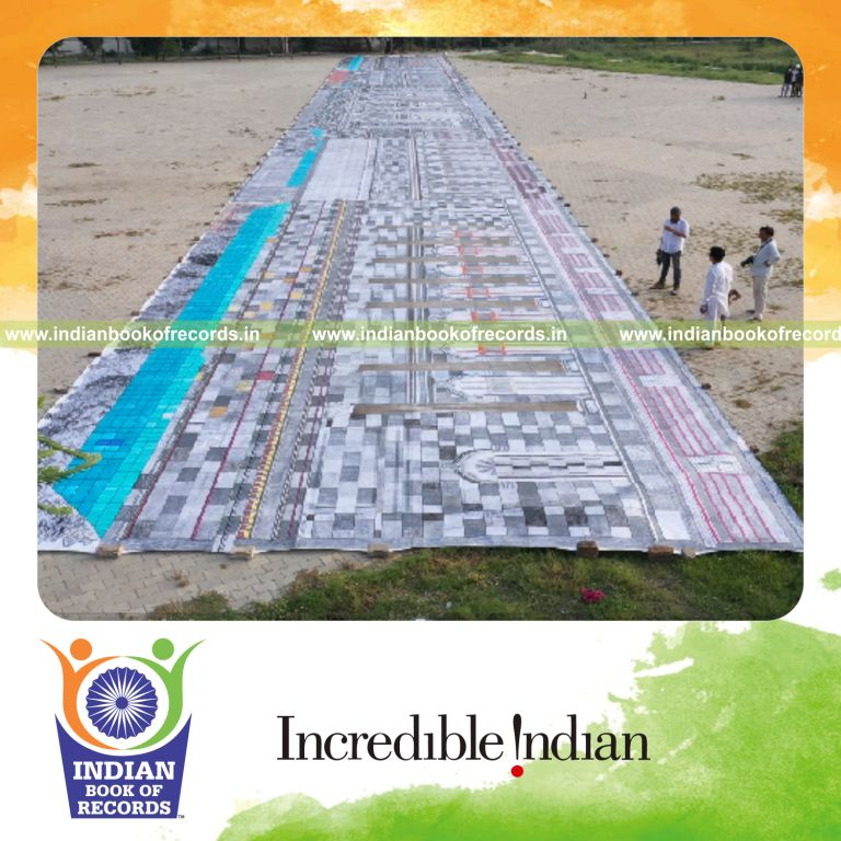 Team creating a massive handmade pencil drawing on a large surface recognized by Indian Book of Records