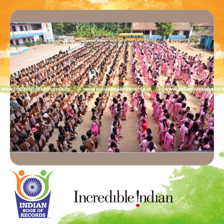 participants taking part in a continuous handshake relay event to set a record for Indian Book of Records