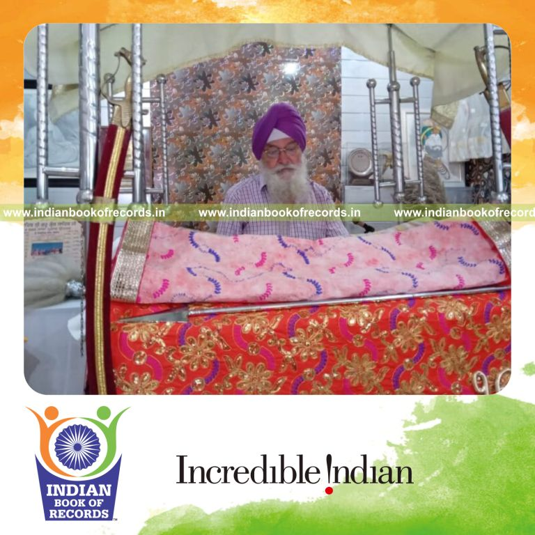 Detailed handwritten and colorful replica of the Guru Granth Sahib recognized by Indian Book of Records