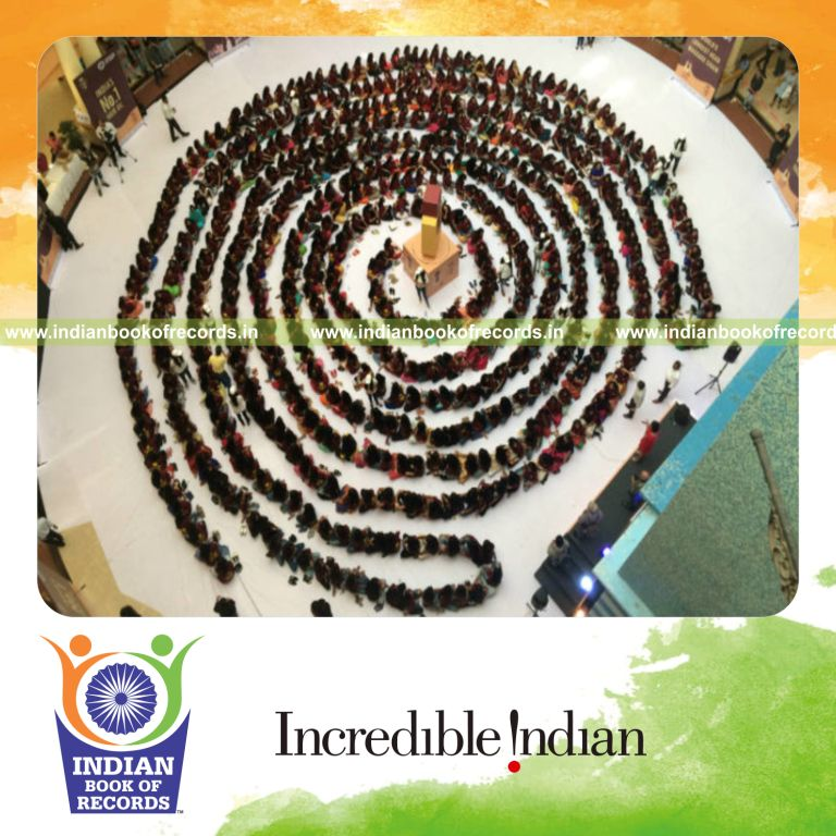 longest chain of people performing head massage for Indian Book of Records