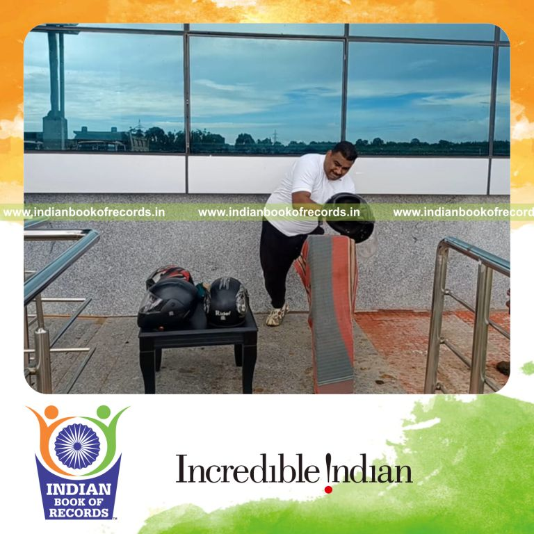 Individual crushing multiple helmets using bare hands within seconds recognized by Indian Book of Records