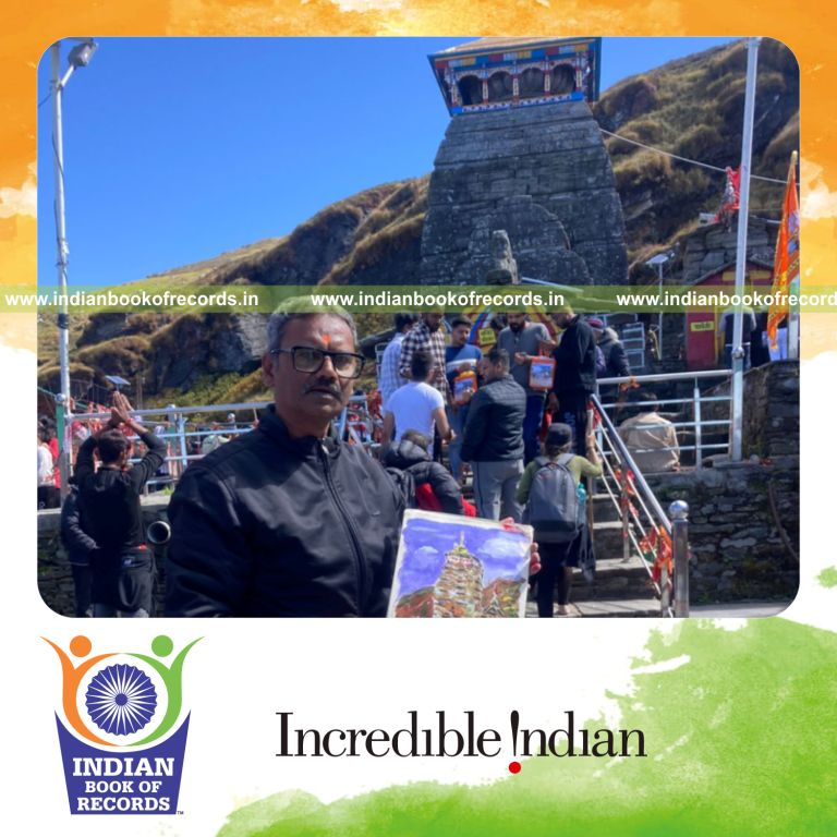 Artist performing live painting at a high-altitude location recognized by Indian Book of Records