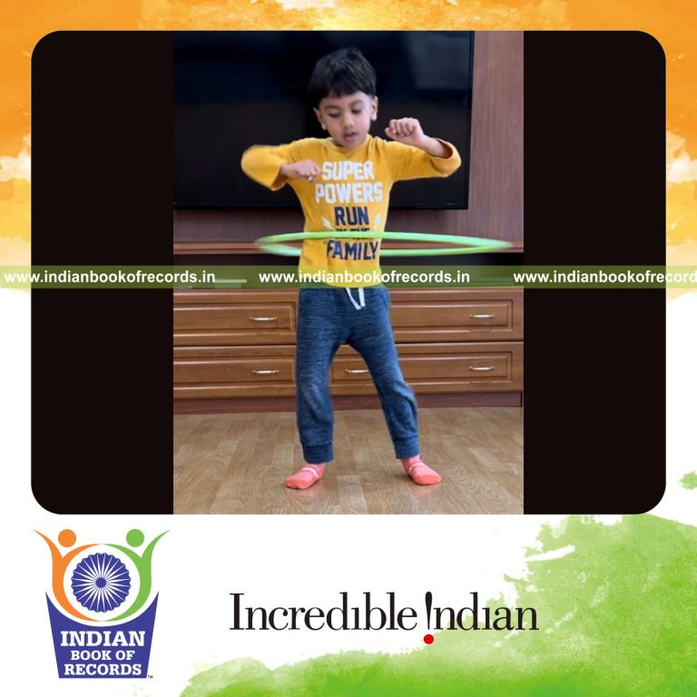 Preschool child performing rapid hula hoop spins within one minute recognized by Indian Book of Records