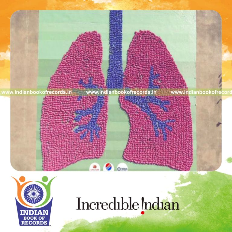 people forming a large human image representing an organ during a coordinated record event for Indian Book of Records