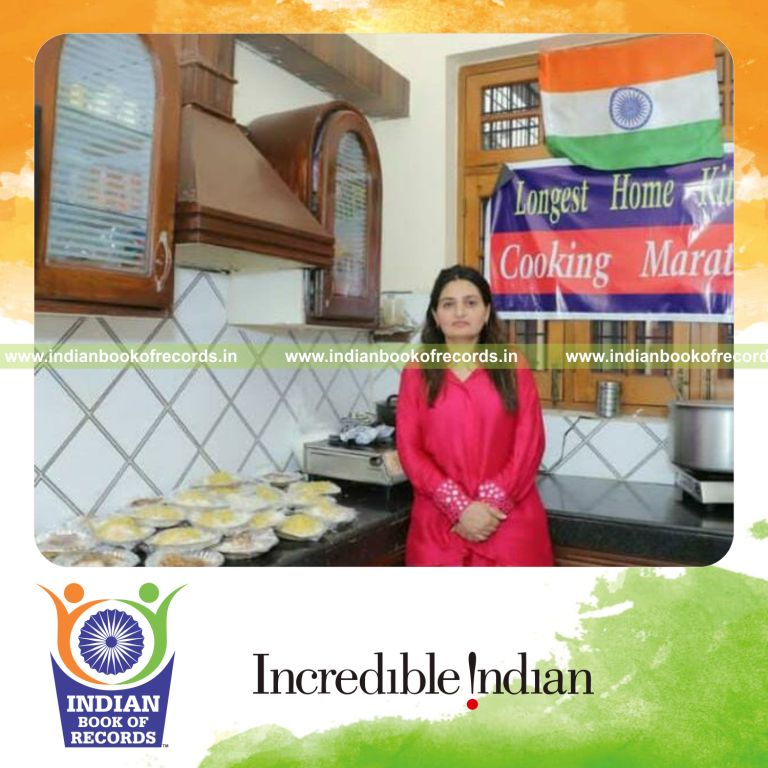 Woman engaged in continuous indoor cooking over an extended period recognized by Indian Book of Records