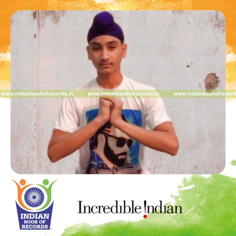 Individual performing rapid jump squats during a one-minute fitness challenge recognized by Indian Book of Records