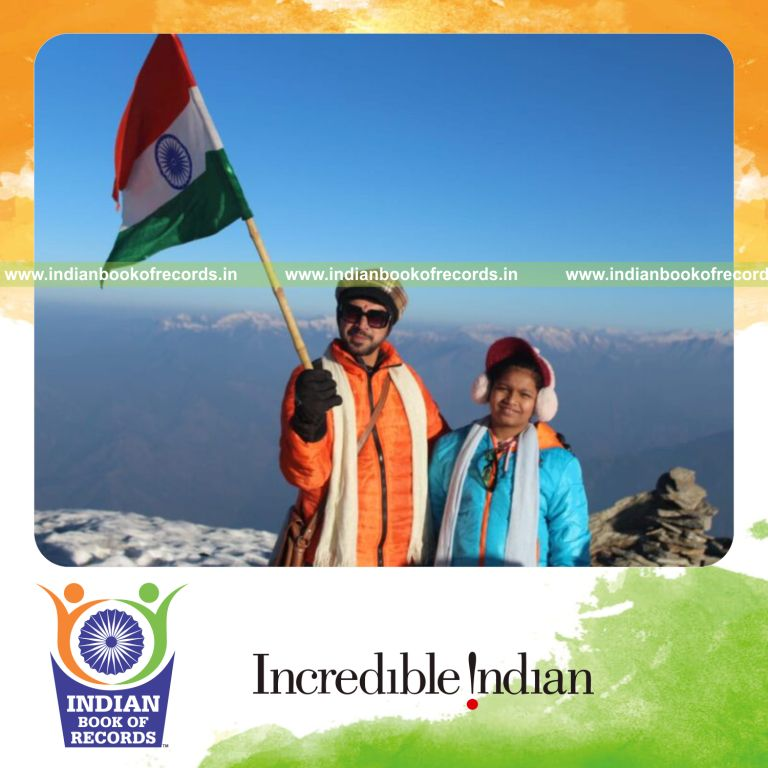 Young girl reaching the summit of Kedarkantha peak during a trekking expedition recognized by Indian Book of Records