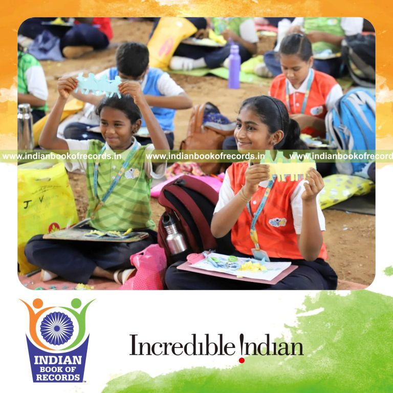 Large group creating kirigami paper models simultaneously at a single venue for Indian Book of Records