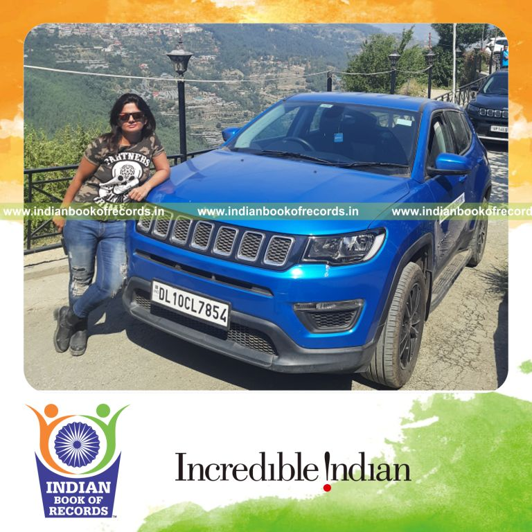 Female driver completing a fast car expedition to Komic village recognized by Indian Book of Records