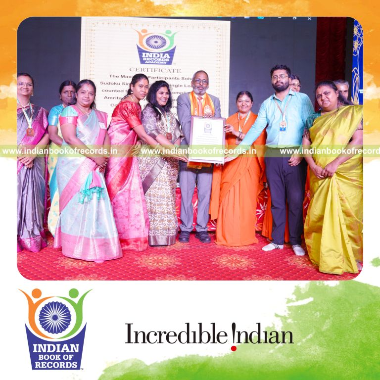 Crowd engaged in solving Sudoku puzzles simultaneously at one location for Indian Book of Records