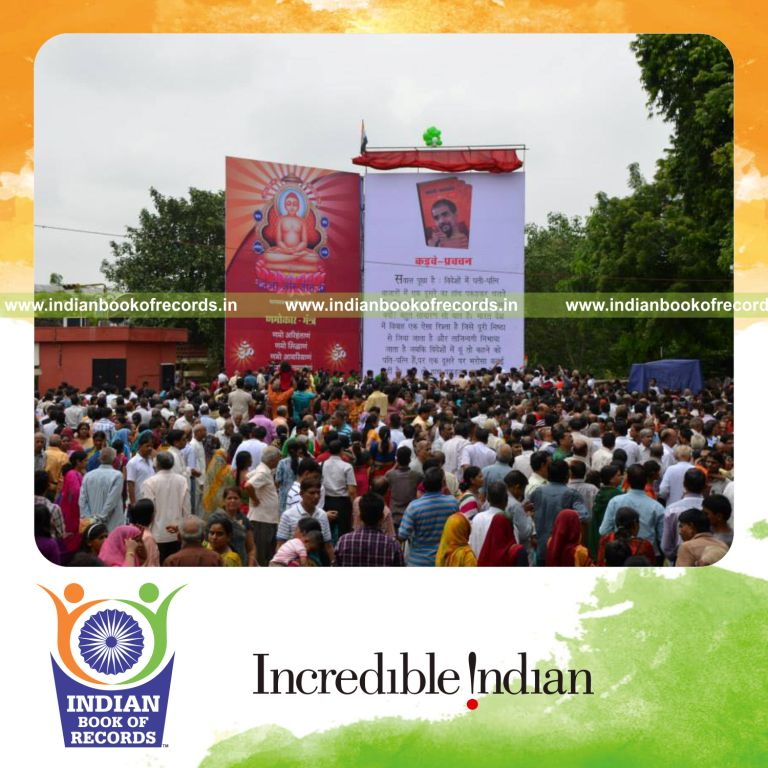 male individual creating largest book for record in Indian Book of Records