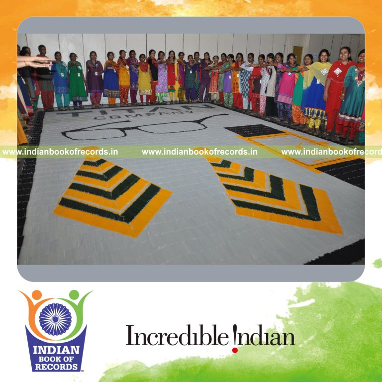 team creating large candle mosaic artwork for Indian Book of Records