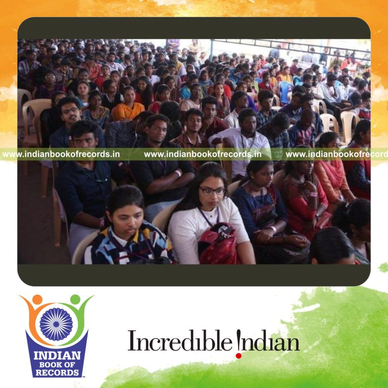 a large group attending a session focused on child safety awareness and protection practices for a record in Indian Book of Records