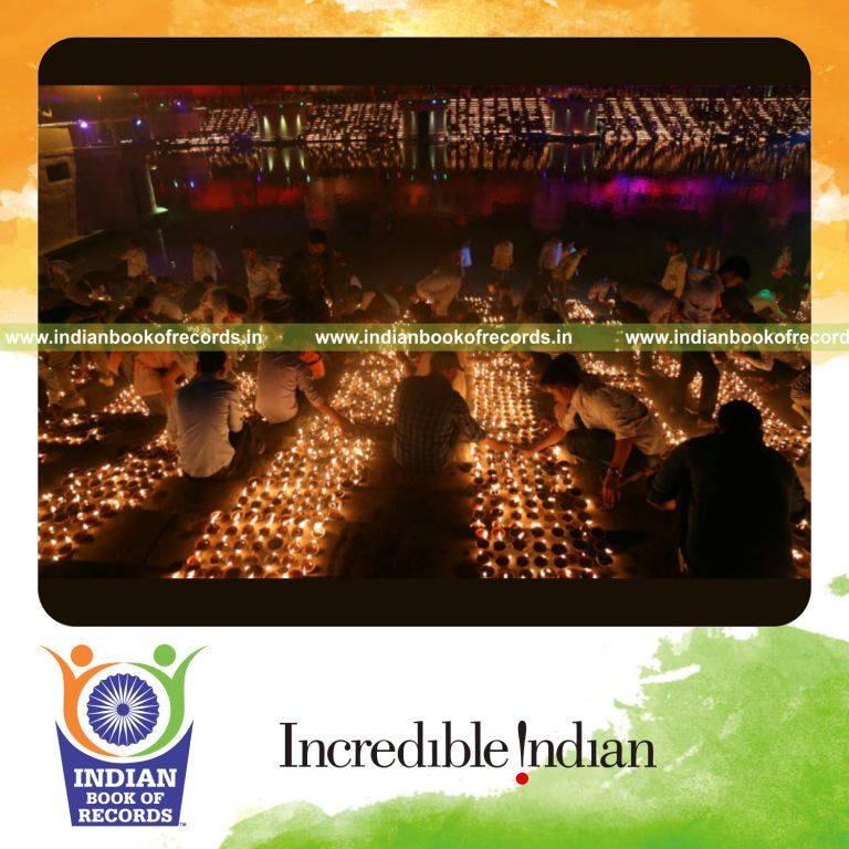 a large collection of oil lamps arranged and displayed together in an organized formation for a record in Indian Book of Records