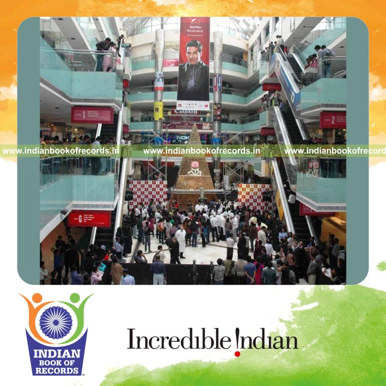 team creating a large eclairs chocolate tower over 72 hours for record in Indian Book of Records