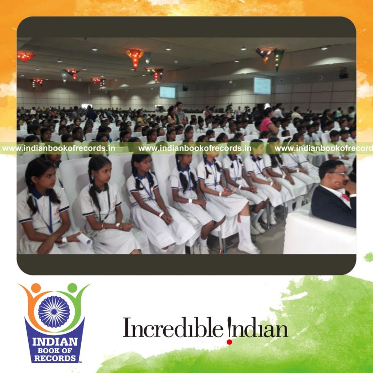 a large group attending a session demonstrating basic first aid techniques and emergency response for a record in Indian Book of Records