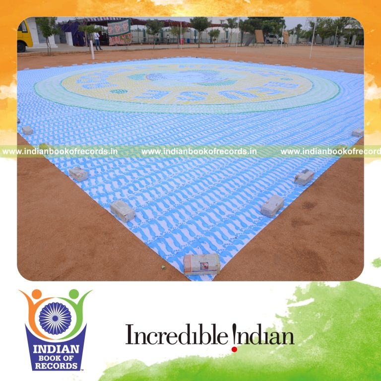 young girl creating footprint painting artwork for Indian Book of Records
