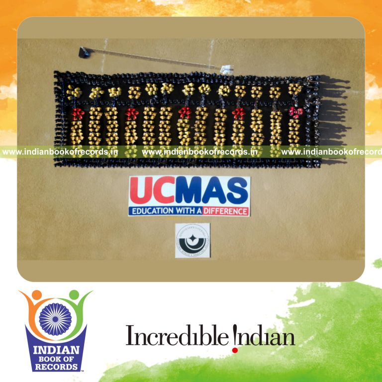 people forming the shape of an abacus in a coordinated arrangement for a record in Indian Book of Records