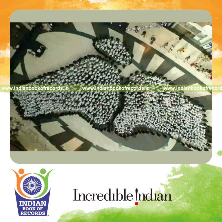 people arranged to create the shape of a human bone in a coordinated formation for a record in Indian Book of Records
