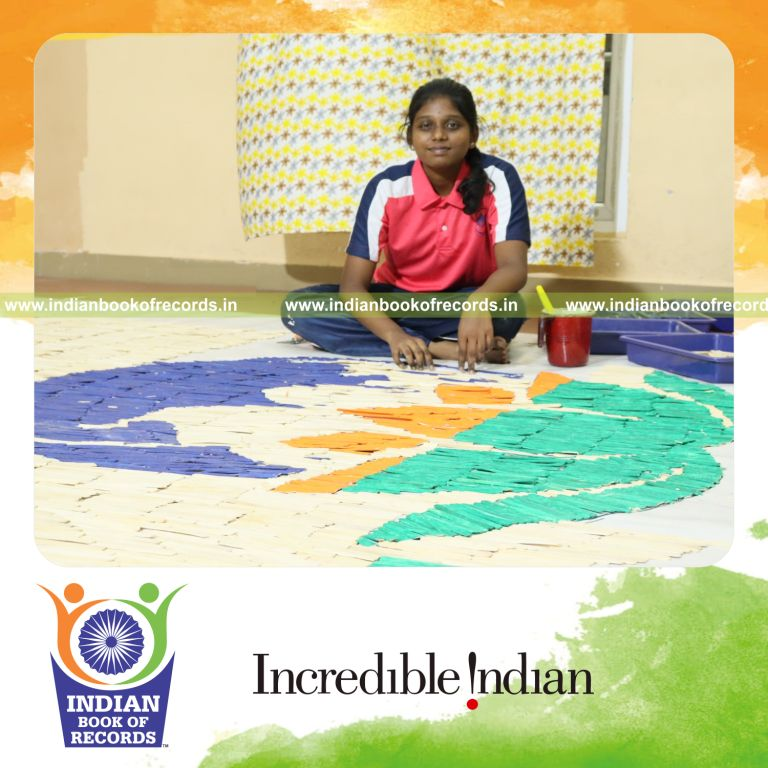 Large mosaic created using ice cream sticks arranged into a detailed pattern for Indian Book of Records