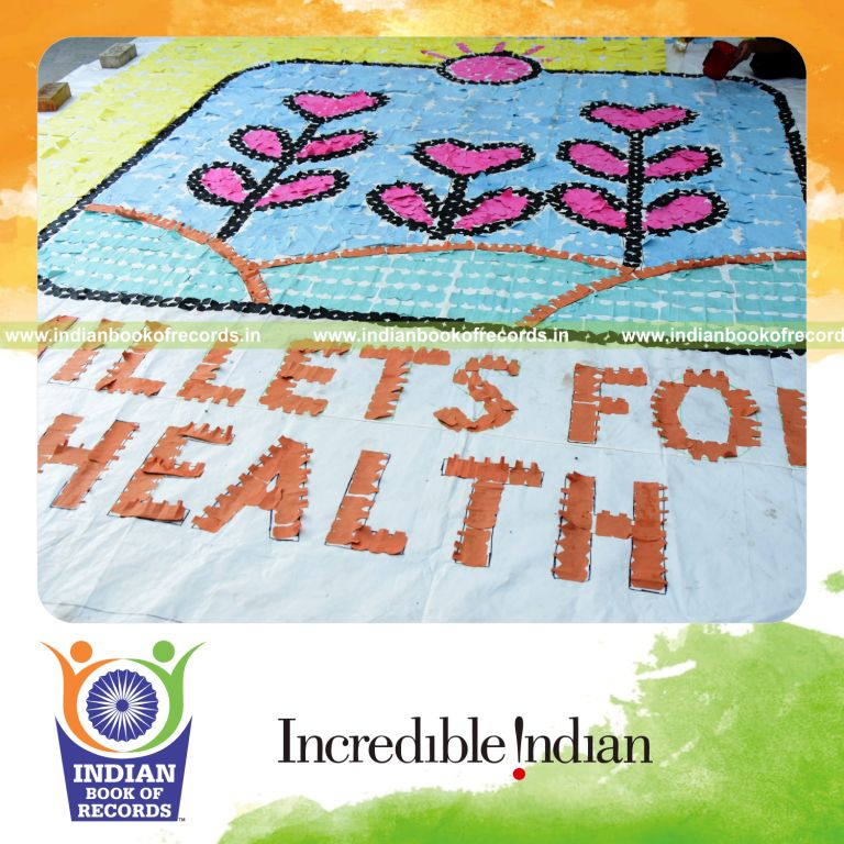 Intricate mosaic created using detailed kirigami paper cut designs forming a large artwork for Indian Book of Records