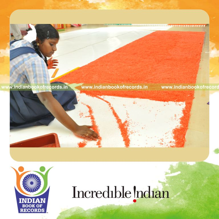 young female creating national flag using salt for record in Indian Book of Records