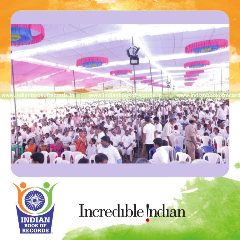 a large group attending a session on oral care practices and dental hygiene awareness for a record in Indian Book of Records