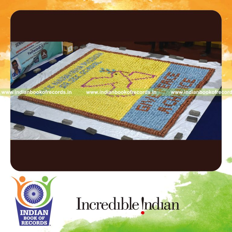 Creative mosaic made with multiple origami balls forming a large visual pattern for Indian Book of Records