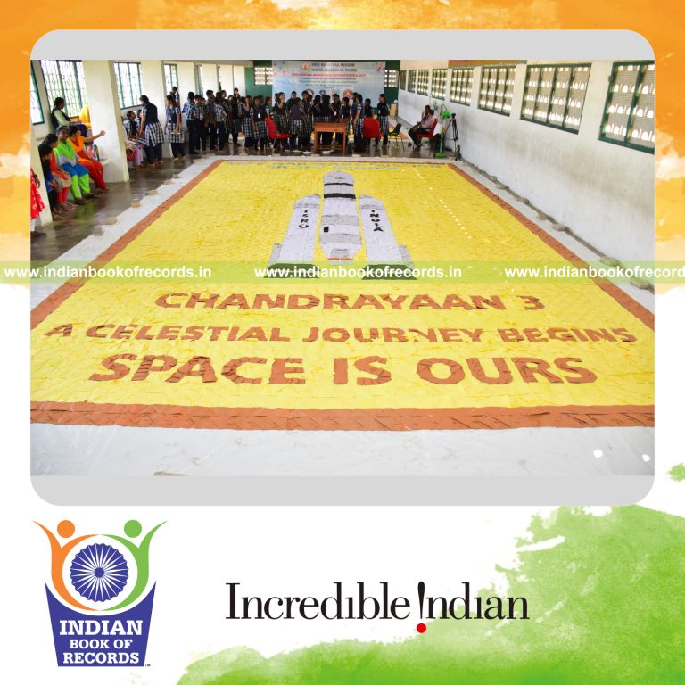 Massive mosaic artwork made of origami fish pieces arranged creatively by a team for Indian Book of Records