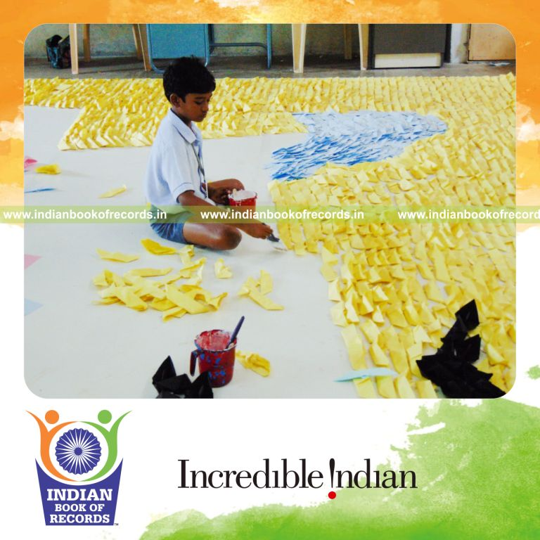 mosaic artwork created using paper boats by minor male for Indian Book of Records