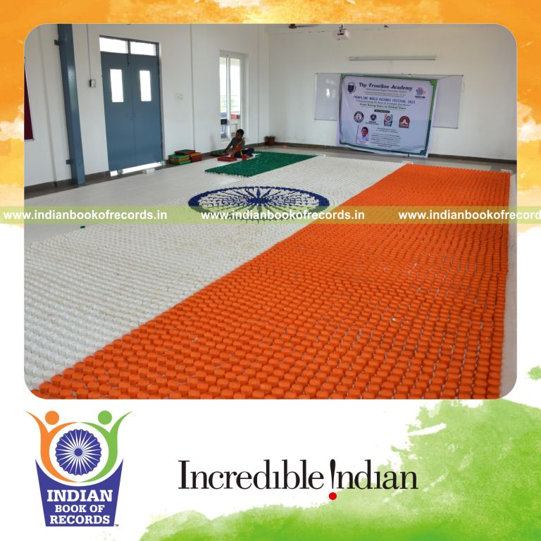 A giant national flag designed using arranged paper cups showcased in Indian Book of Records