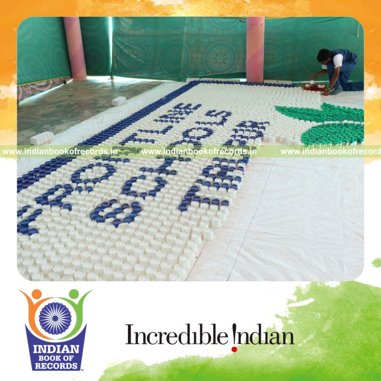 Mosaic artwork formed using multiple paper cups arranged creatively for Indian Book of Records