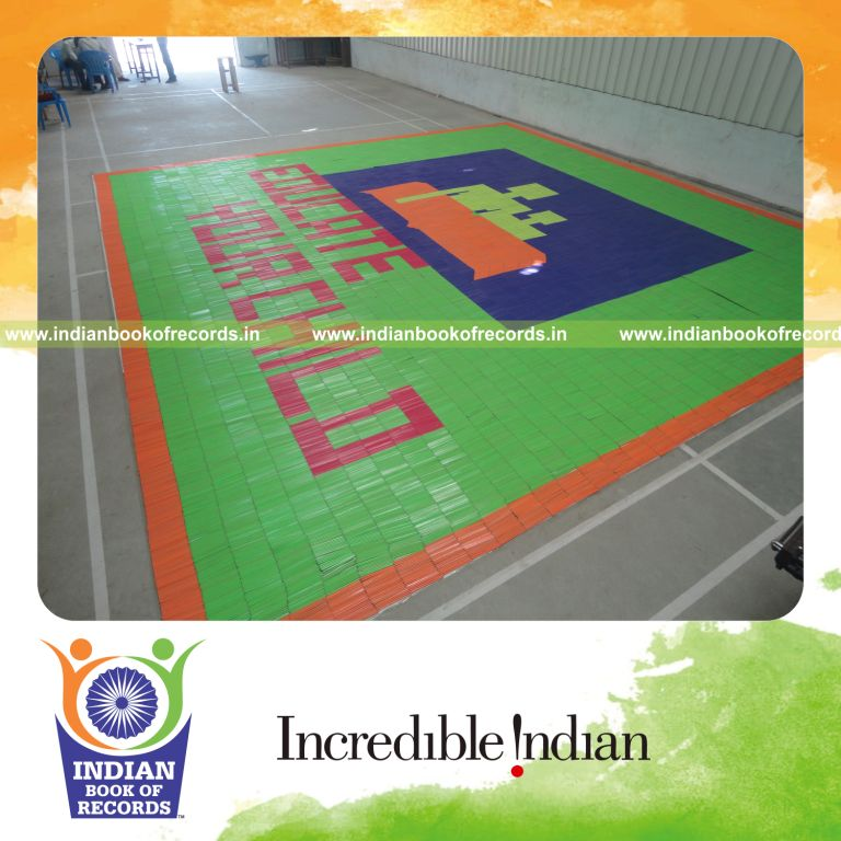 young male creating large mosaic using pencils for record in Indian Book of Records