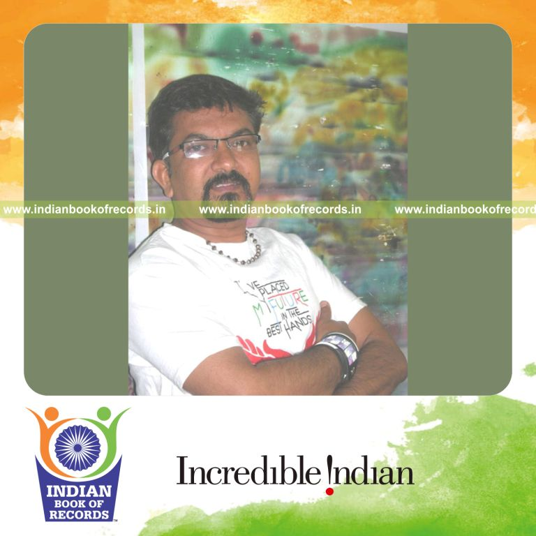 male individual creating portrait using bangles for record in Indian Book of Records