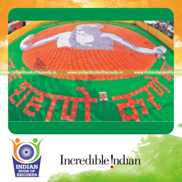 a large portrait of saint gorobakaka created using arranged books for a record in Indian Book of Records