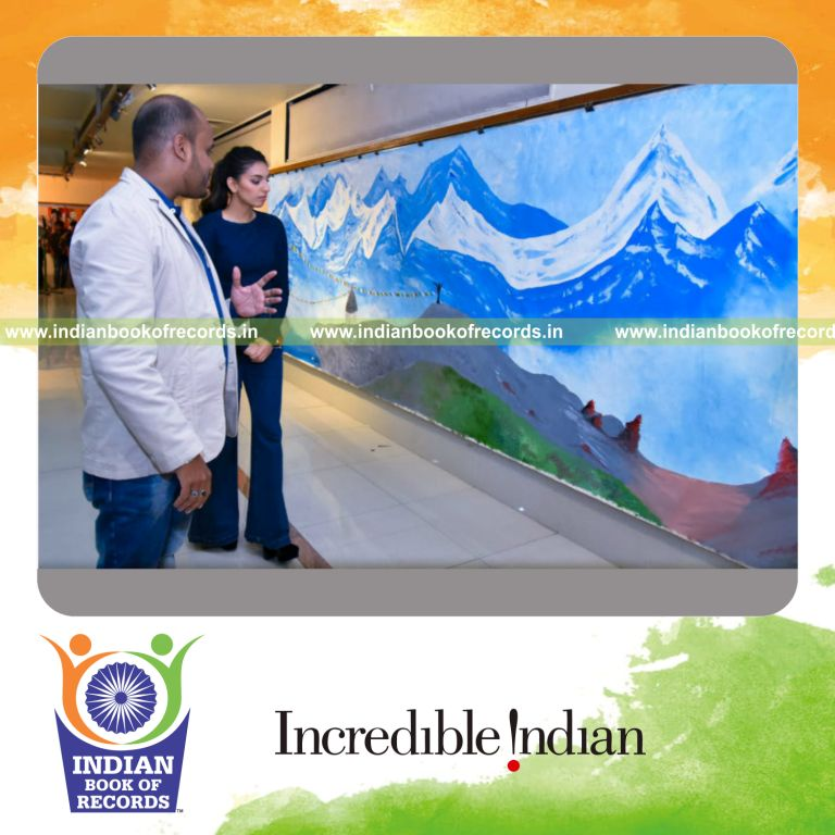 an artist creating a large scale oil painting using professional techniques for a record in Indian Book of Records