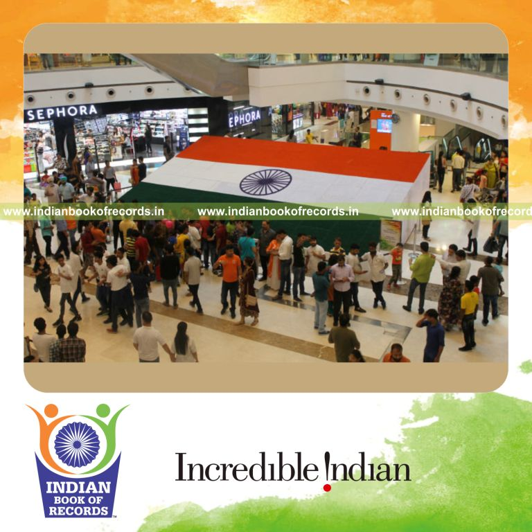 a national flag design created using quilling paper strips arranged as a mosaic artwork for a record in Indian Book of Records