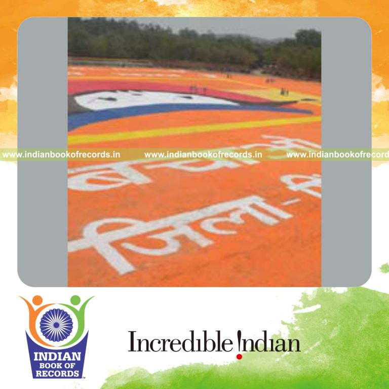 team creating large rangoli artwork for record in Indian Book of Records
