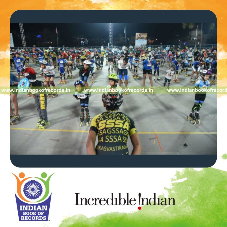 a large group learning roller skating techniques together in a coordinated session for a record in Indian Book of Records