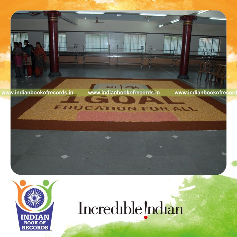 team creating an large mosaic artwork using seeds for record in Indian Book of Records