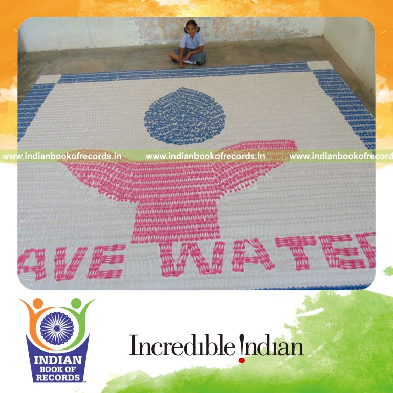 mosaic artwork created using spoons by minor female for Indian Book of Records