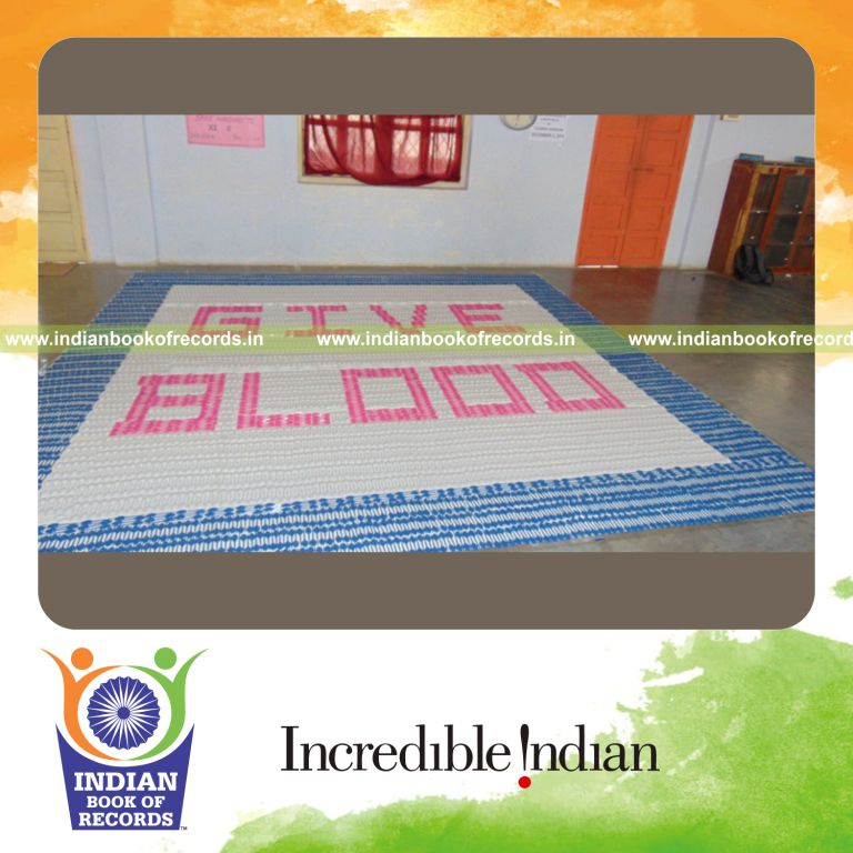 mosaic artwork created using spoons by minor male for Indian Book of Records
