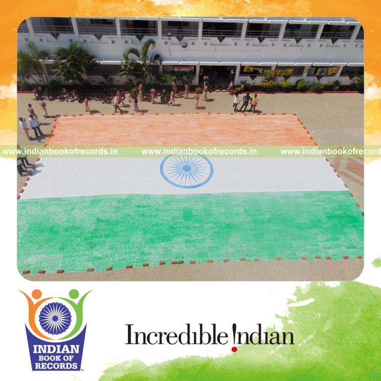 team creating largest indian national flag using thumbprints for Indian Book of Records